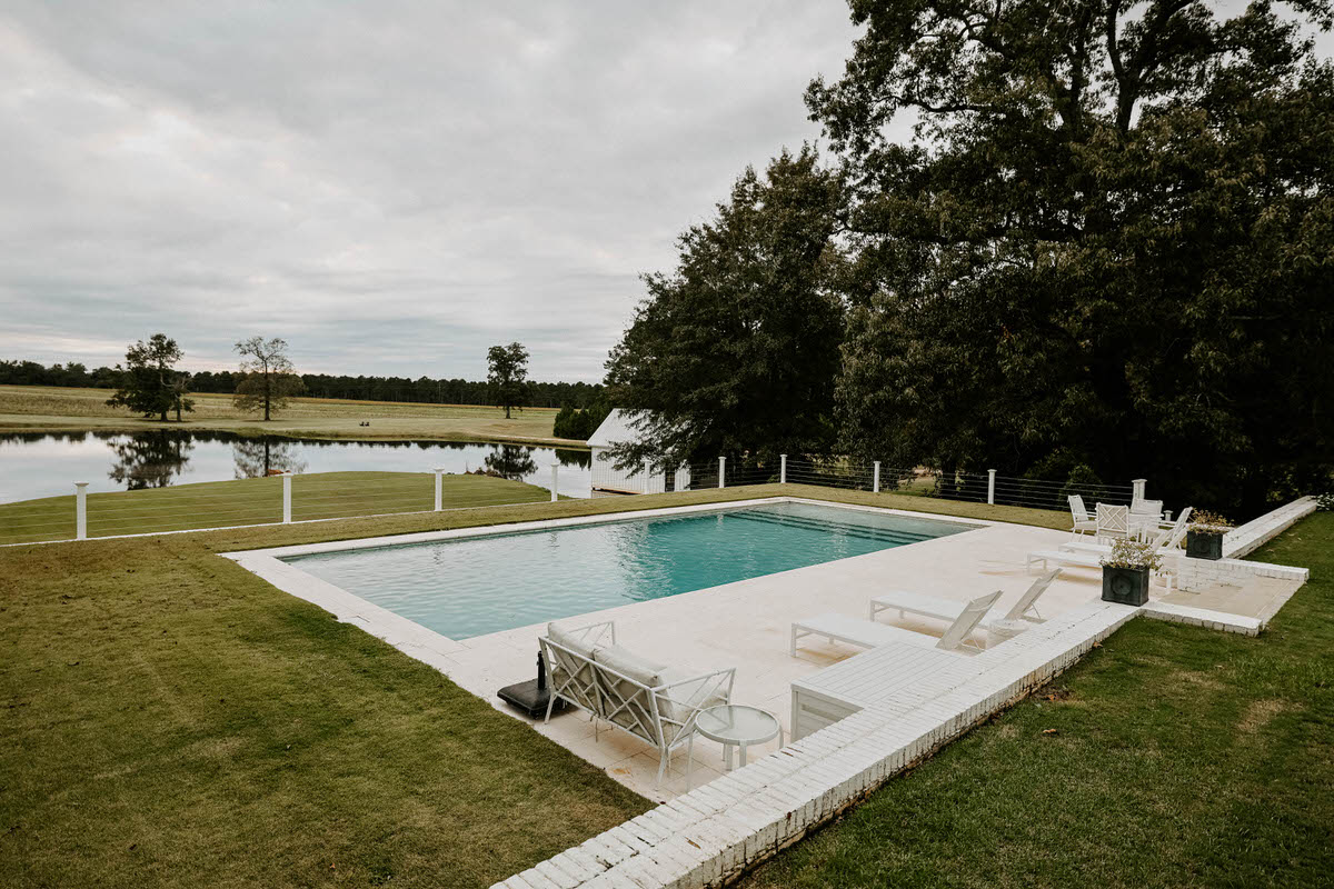Newly built inground pool in a Middle Georgia backyard at the end of the pool build process